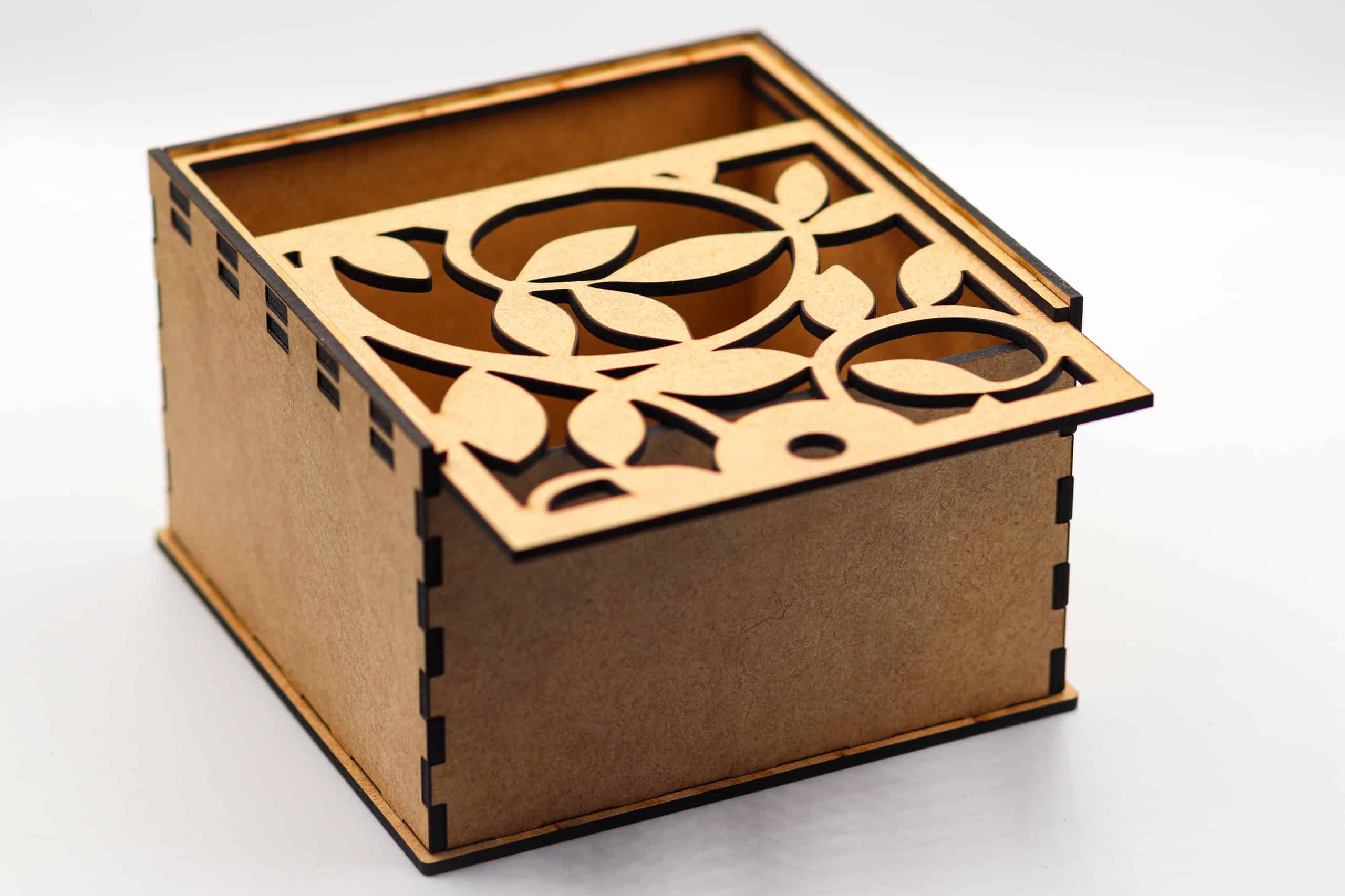 Corner angle of MDF gift box with floral laser-cut sliding lid